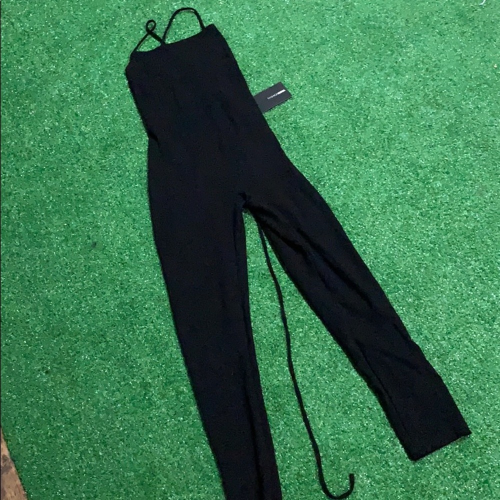 - FASHION NOVA BACKLESS LACE UP JUMP SUIT -